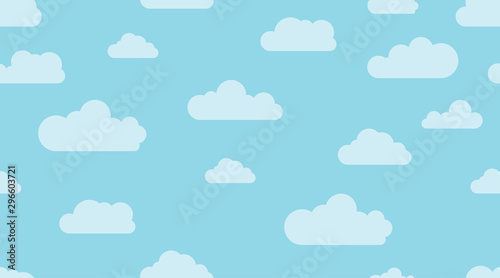 Vector cartoon seamless pattern of flat shape clouds on a blue background. Abstract cloudscape, heaven and sky print for kids room wallpaper