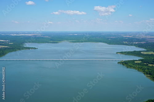 Aerial view of Lavon Lake, Texas, USA. East Lucas Road Bridge over Lake Lavon. Fresh water reservoir, located in Collin County, part of the Dallas-Fort Worth-Arlington, Texas Metropolitan Area.