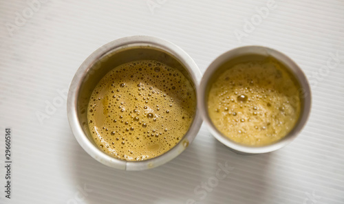 Indian filter coffee is famous coffee in steel cup.