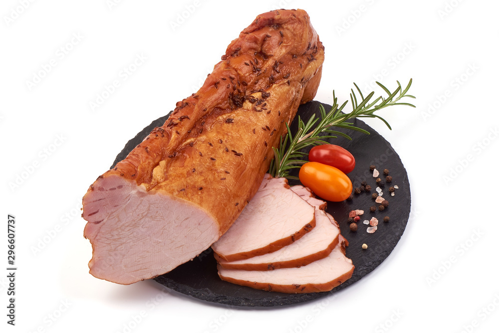 Sliced smoked pork loin on a stone plate, pork meat, isolated on white background