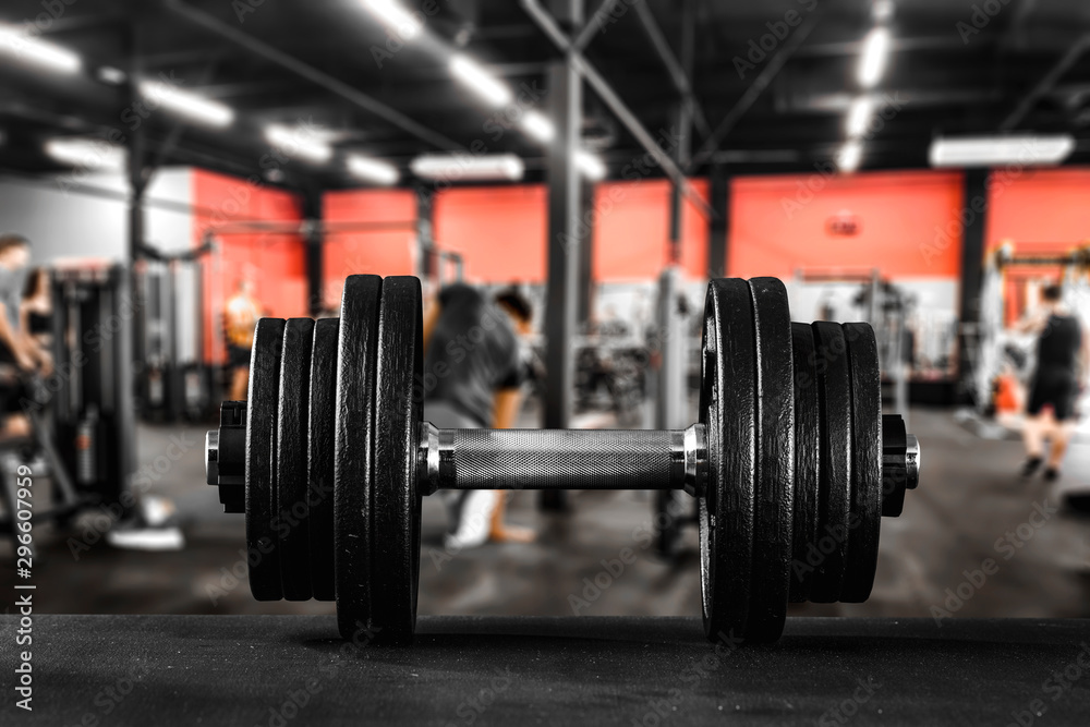 Dumbbells in gym interior and free space for your decoration Dumbbells in gym interior and free space for your decoration
