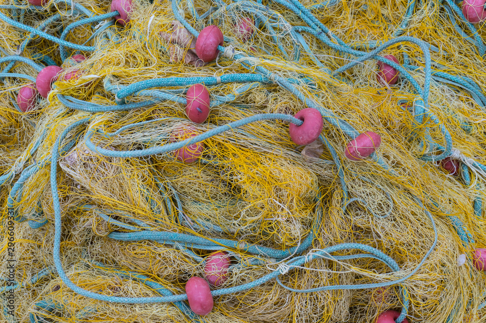 Tangled fishing nets and floats close-up on the shore Tangled fishing nets and floats close-up on the shore