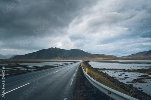 Mountain Iceland road in foggy, cloudy day. Backplate road. 