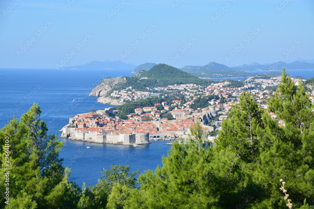 An top view of Dubrovnik old town with greenery 