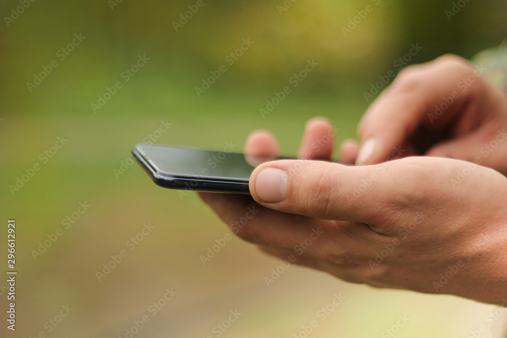 a man uses a smartphone. modern technologies in everyday life.