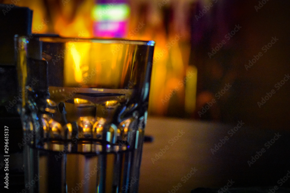 glass of whiskey on table