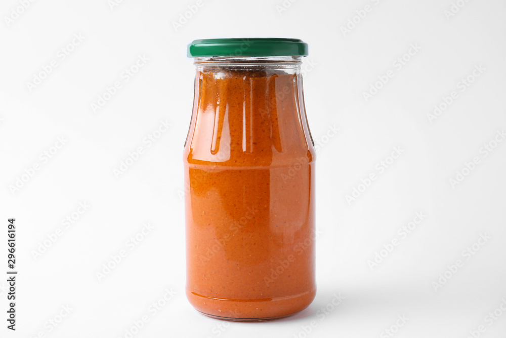 Jar of butternut squash spread on white background. Pickled food Jar of butternut squash spread on white background. Pickled food