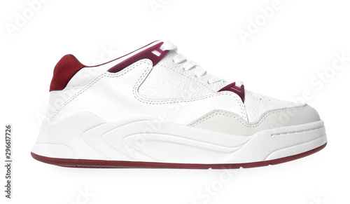 Stylish sneaker on white background, top view