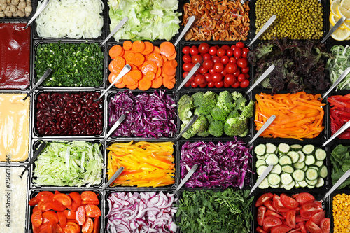 Cuadro en lienzo Salad bar with different fresh ingredients as background, top view