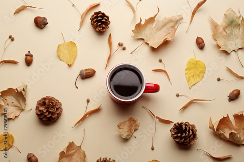 Flat lay composition with hot drink on beige background. Cozy autumn