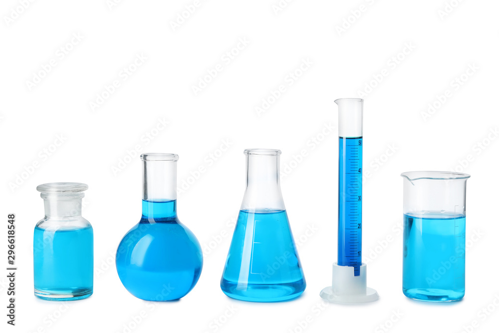Laboratory glassware with blue liquids isolated on white Laboratory glassware with blue liquids isolated on white