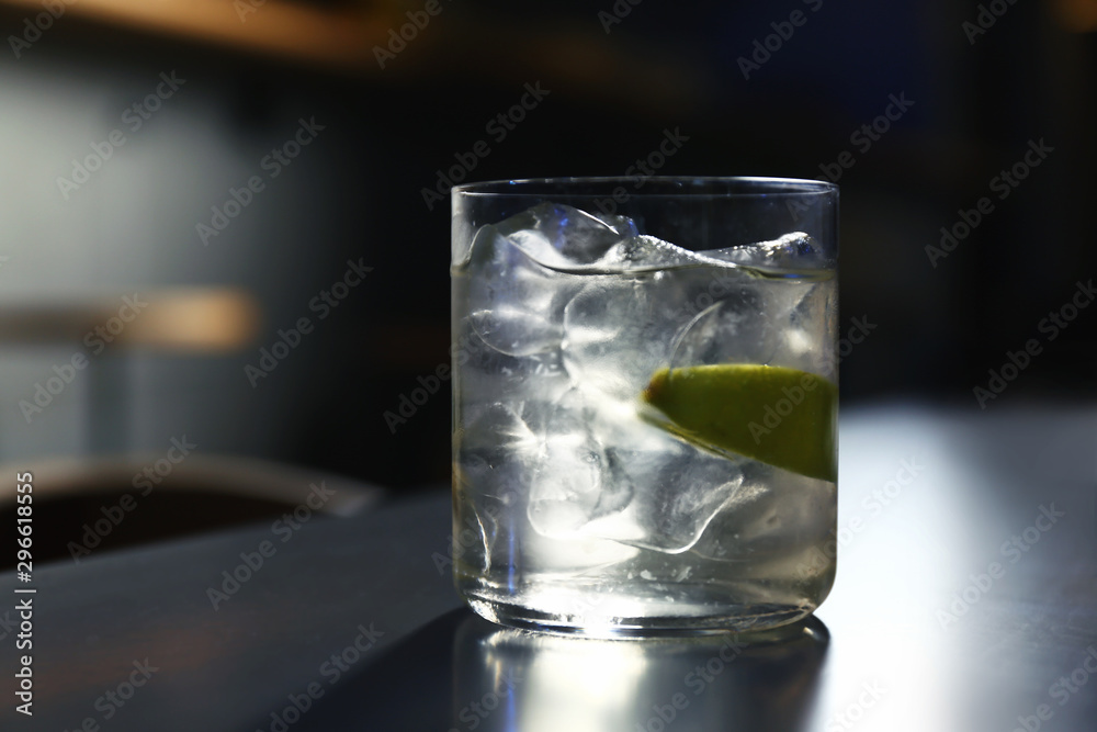 Glass of delicious cocktail with vodka on counter in bar Glass of delicious cocktail with vodka on counter in bar