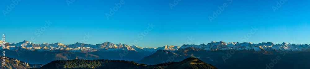Panorama landscape view of Alps in Switzerland from the top of Rigi Kulm on twilight time.
