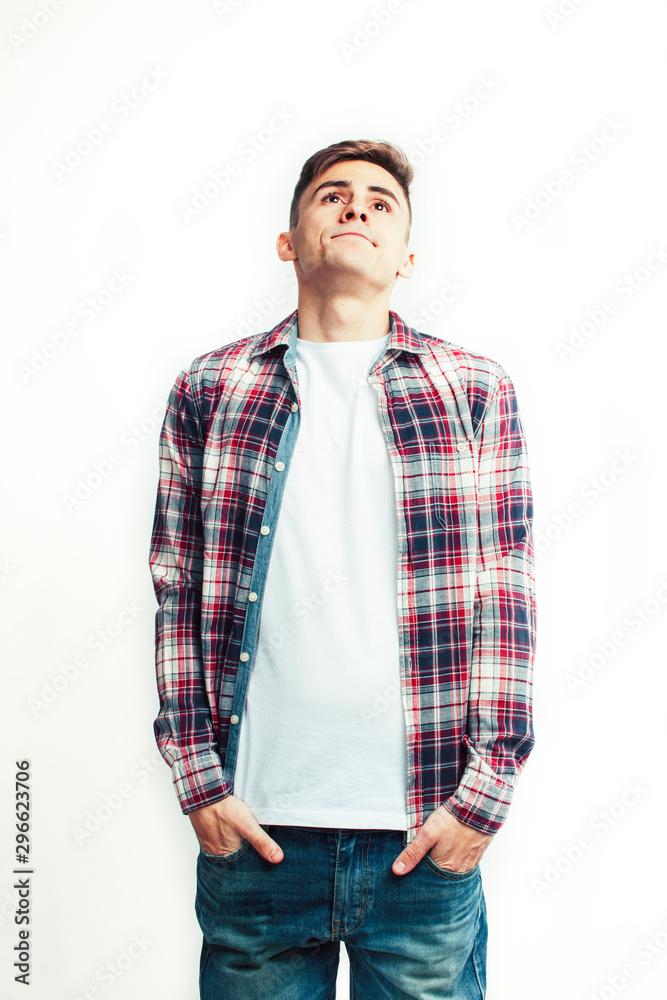 young handsome teenage hipster guy posing emotional, happy smiling against white background isolated, lifestyle people concept young handsome teenage hipster guy posing emotional, happy smiling against white background isolated, lifestyle people concept