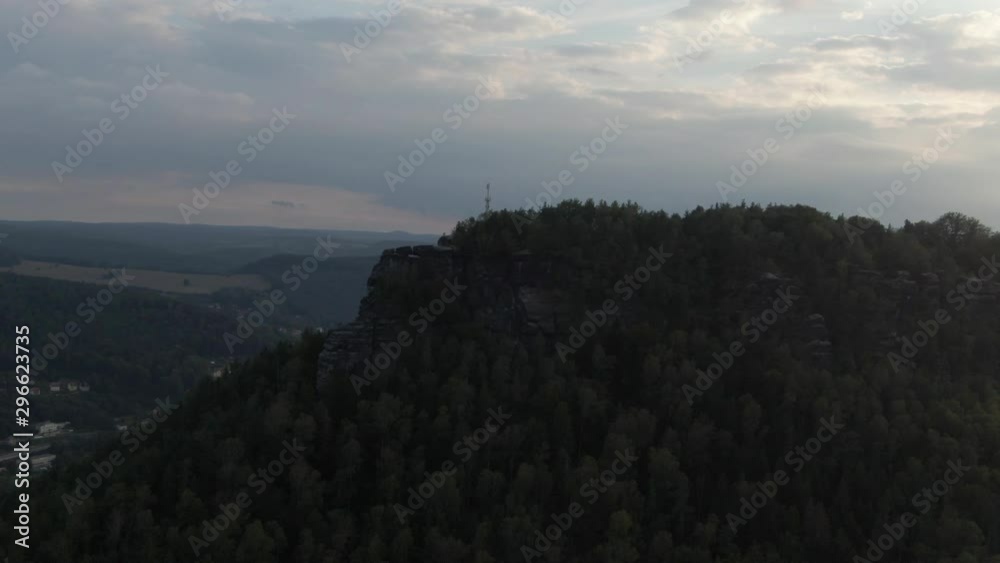 Germany, aerial zoom in on mountain. Lake below. Germany, aerial zoom in on mountain. Lake below.