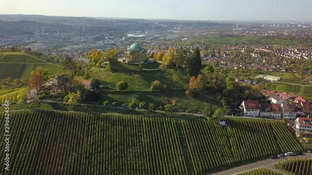 Aerial of the Grave Chapel (Grabkapelle) on Rotenberg and surrounding industrial area with museums and soccer stadium on a beautiful autumn day in Stuttgart, Germany