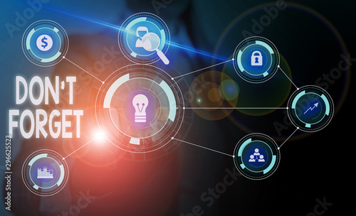 Text sign showing Don T Forget. Business photo showcasing Know by Heart Think Back Fix in the Mind Refresh Memory Woman wear formal work suit presenting presentation using smart device