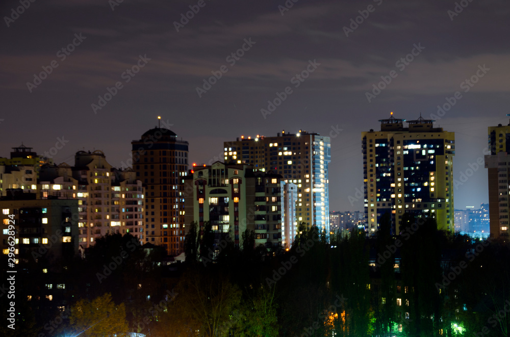 Beautiful modern city at night. Panoramic view of the metropolis. The lights of the big city