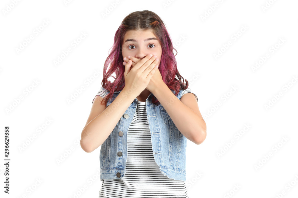 Beautiful young girl closing mouth by hands on white background Beautiful young girl closing mouth by hands on white background