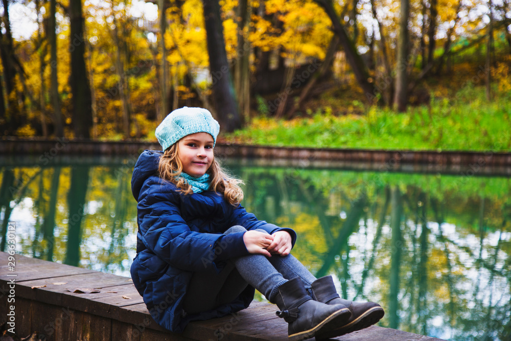 Beautiful girl with long blond hair in the autumn Park. Brown-eyed girl with Golden tresses on a background of yellow autumn leaves. Beautiful girl with long blond hair in the autumn Park. Brown-eyed girl with Golden tresses on a background of yellow autumn leaves.