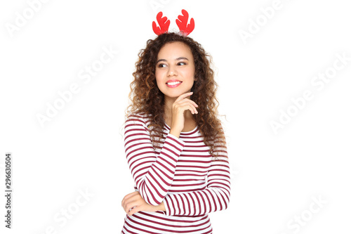 Beautiful american woman in red horns isolated on white background