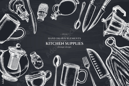 Floral design with chalk Chef s knifes, teaspoon, spoon, fork, knife, cutting board, bottle of oil, teapots, coffee pot, cups, sugar bowl, pepper shaker, salt shaker
