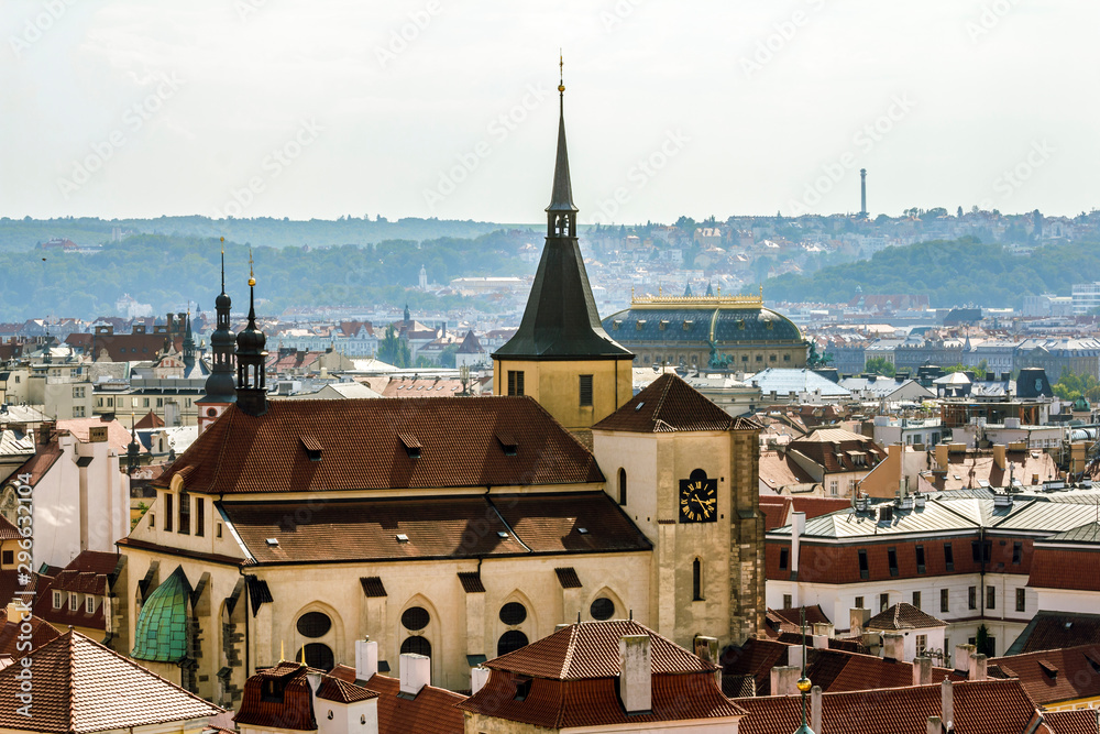 Obraz premium View from the height of the roofs and towers in Prague.