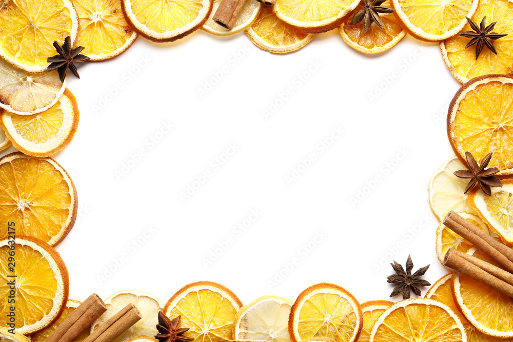 Frame from Dried citrus fruits with cinnamon, star anise on white background. Mulled Wine Ingredients Frame from Dried citrus fruits with cinnamon, star anise on white background. Mulled Wine Ingredients