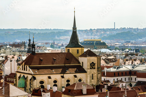 View from the height of the roofs and towers in Prague. © toshket