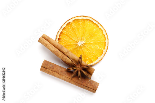 Dried citrus fruits with cinnamon, star anise on white background. Mulled Wine Ingredients