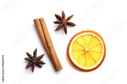 Dried citrus fruits with cinnamon, star anise on white background. Mulled Wine Ingredients