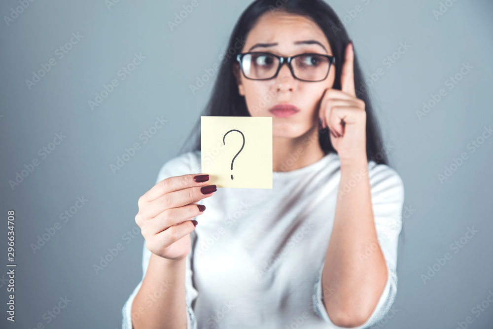 thinking woman hand question mark sign
