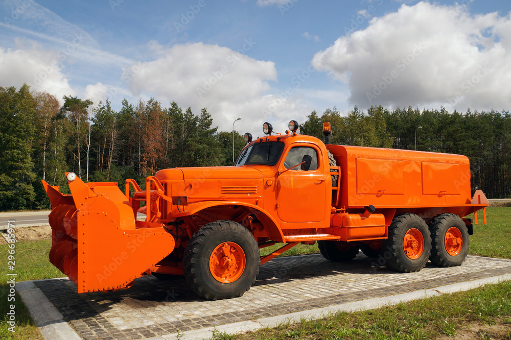 Antique snow plow. Vehicle display at the highway.