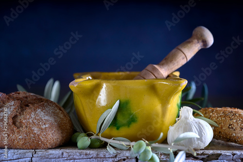 Yellow mortar to make a sauce called allioli, typical of Catalonia. Spain.