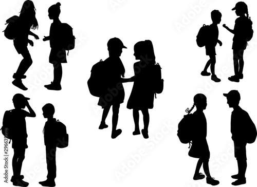 Silhouettes of a children with a backpack .