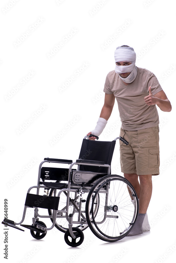 Injured man in wheel-chair isolated on white