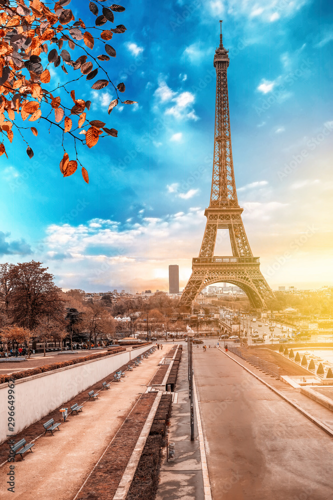 View of Eiffel Tower at sunrise from Jardins du Trocadero in Paris, France. Eiffel Tower is one of the most iconic landmarks of Paris.