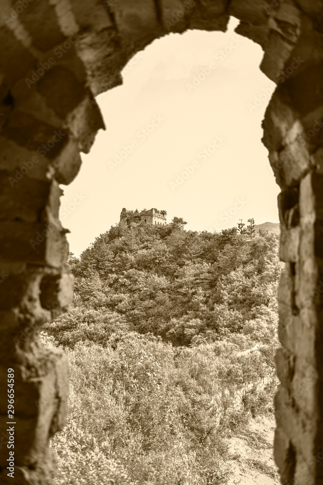 A close-up view of watchtower watchtower on the Great Wall, an ancient Chinese building, in yumuling, qianxi county, hebei province, China. Monochrome black and white, retro yellow creative