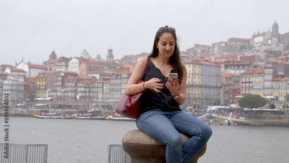 Beautiful girl in front of the skyline of Porto in Portugal - travel photography Beautiful girl in front of the skyline of Porto in Portugal - travel photography