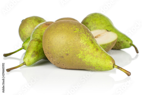 Lot of whole one half of fresh green pear isolated on white background