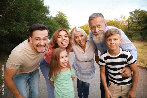 Happy family having fun in park