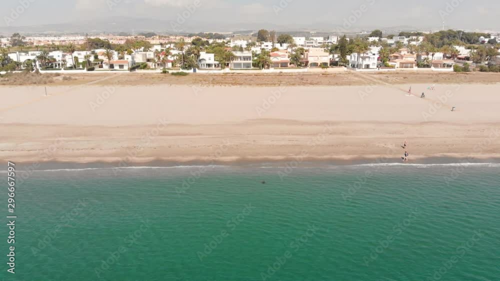 The beach of Playas de Vera in Almeria, Southern Spain. Aerial shot of a hot summer day. The beach of Playas de Vera in Almeria, Southern Spain. Aerial shot of a hot summer day.