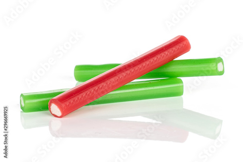 Group of three whole sweet stick candy isolated on white background