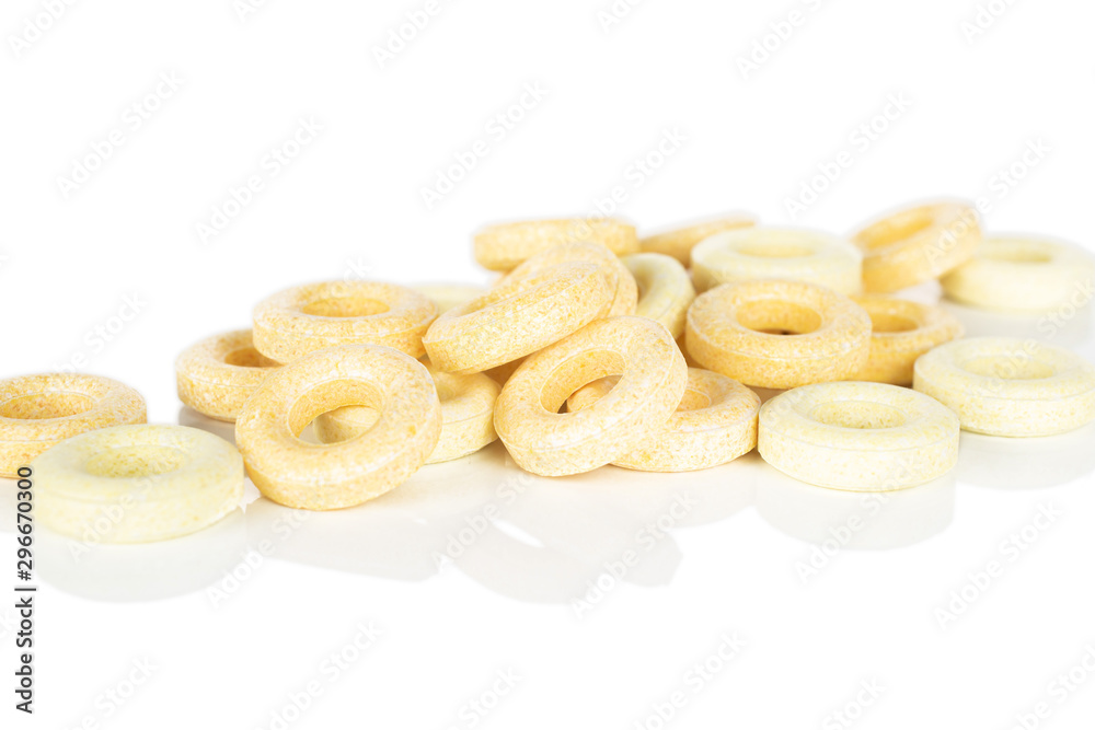 Lot of whole bright round pale yellow candy front focus isolated on white background Lot of whole bright round pale yellow candy front focus isolated on white background