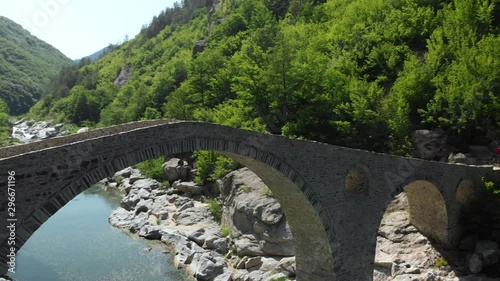 Aerial shot over the Devil's Bridge spanning the Arda River in Bulgaria. photo