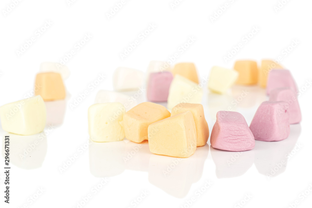 Lot of whole disordered soft pastel candy isolated on white background Lot of whole disordered soft pastel candy isolated on white background