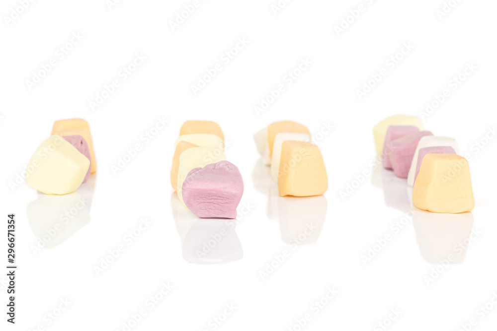Lot of whole light soft pastel candy isolated on white background