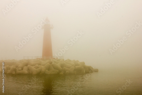 Lighthouse, sea, fog.