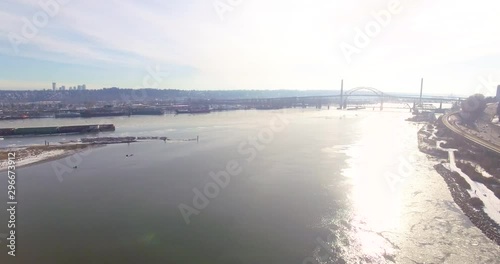 Wallpaper Mural Flying over a frozen working river with bridges and misty sky. Beautiful tranquil moving chunks of ice. Torontodigital.ca