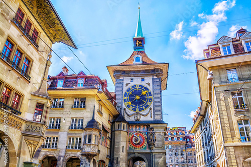 Astronomical clock on the medieval Zytglogge clock tower in Kramgasse street in old city center of Bern, Switzerland photo